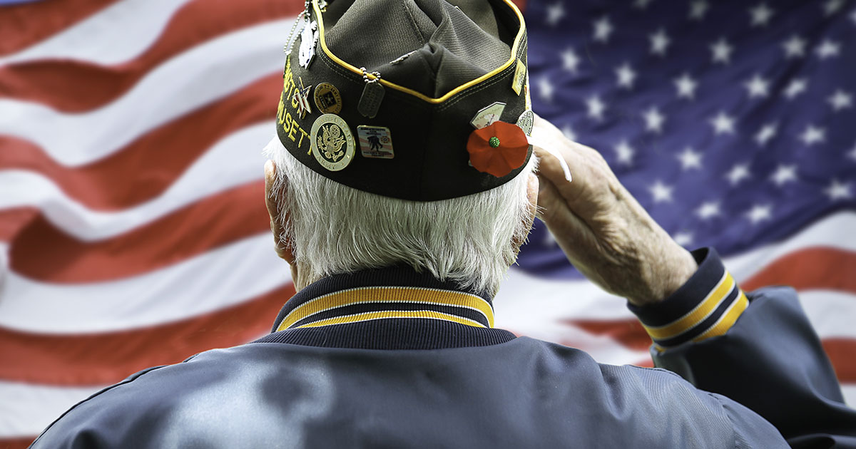 Veteran Saluting U.S. Flag